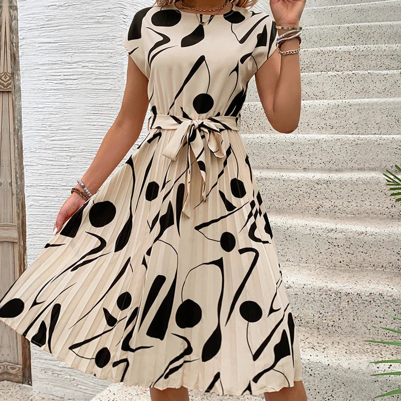 Allaine | Elegant pleated midi dress with waist belt