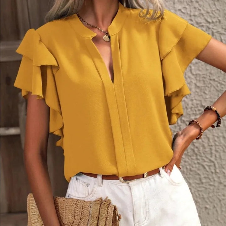 Amira | Elegant blouse with decorative sleeves