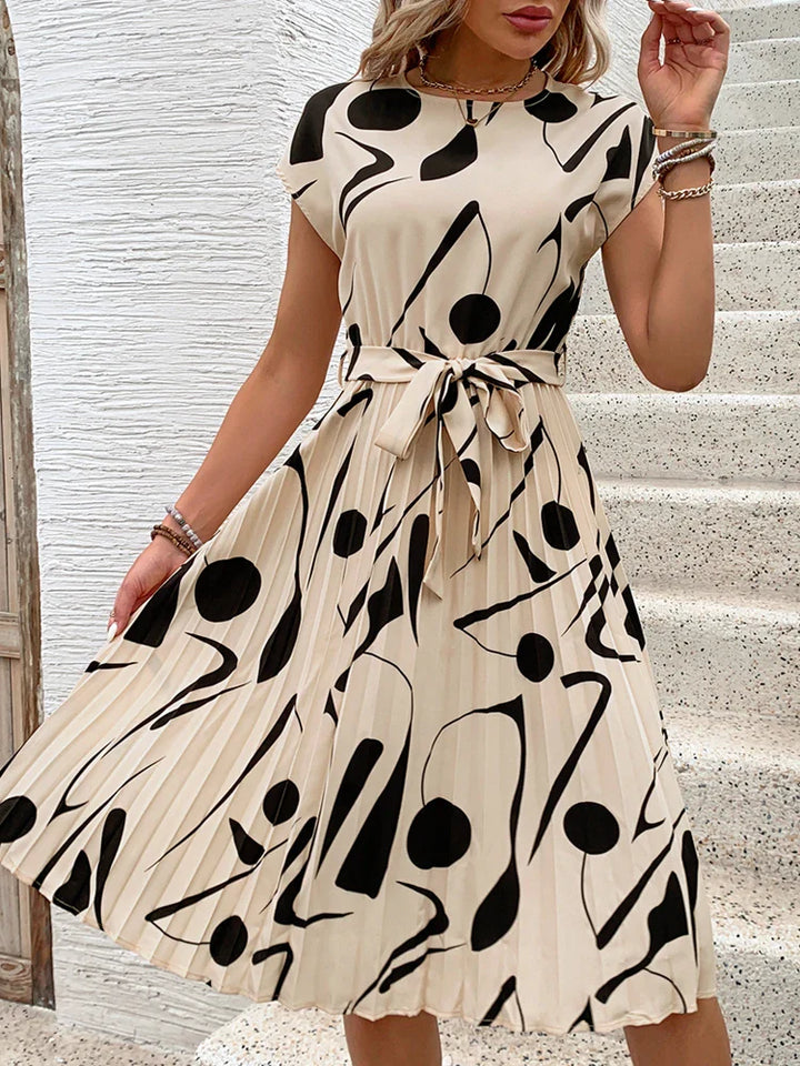 Allaine | Elegant pleated midi dress with waist belt