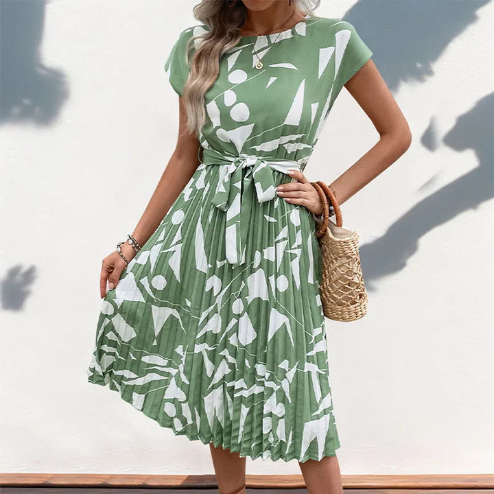 Allaine | Elegant pleated midi dress with waist belt