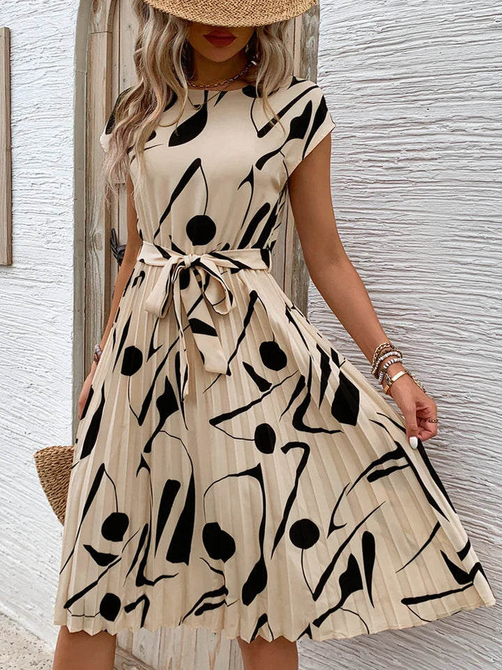 Allaine | Elegant pleated midi dress with waist belt