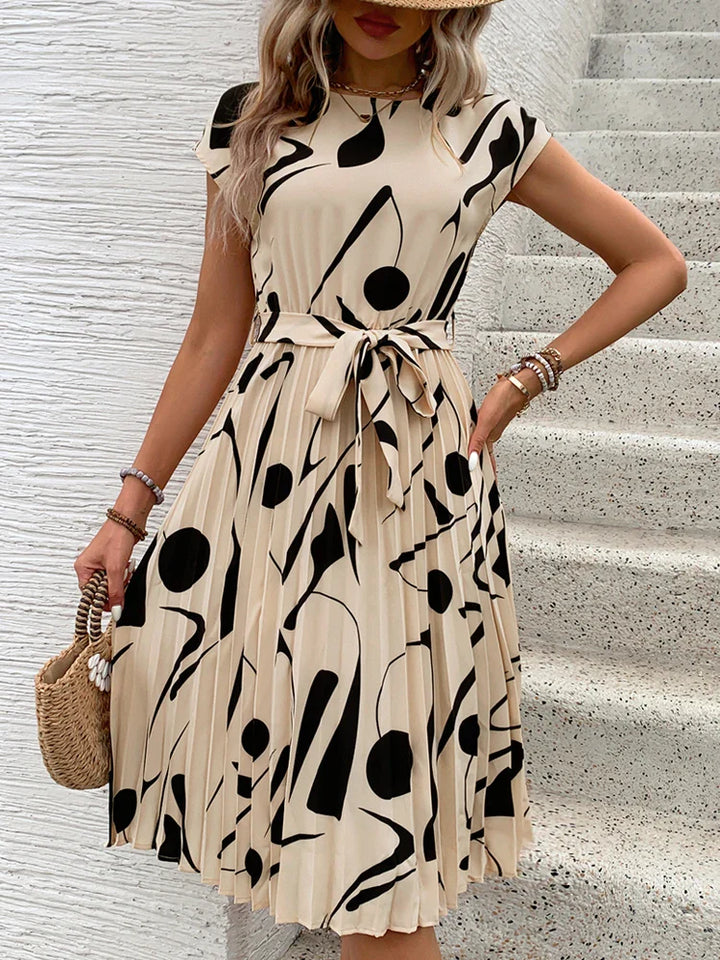 Allaine | Elegant pleated midi dress with waist belt