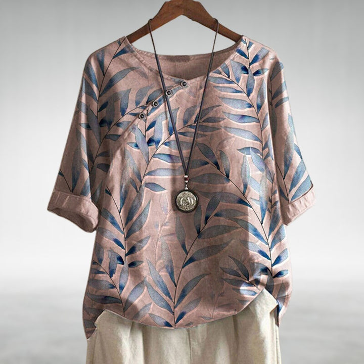 Toni | Elegant blouse with a playful twist