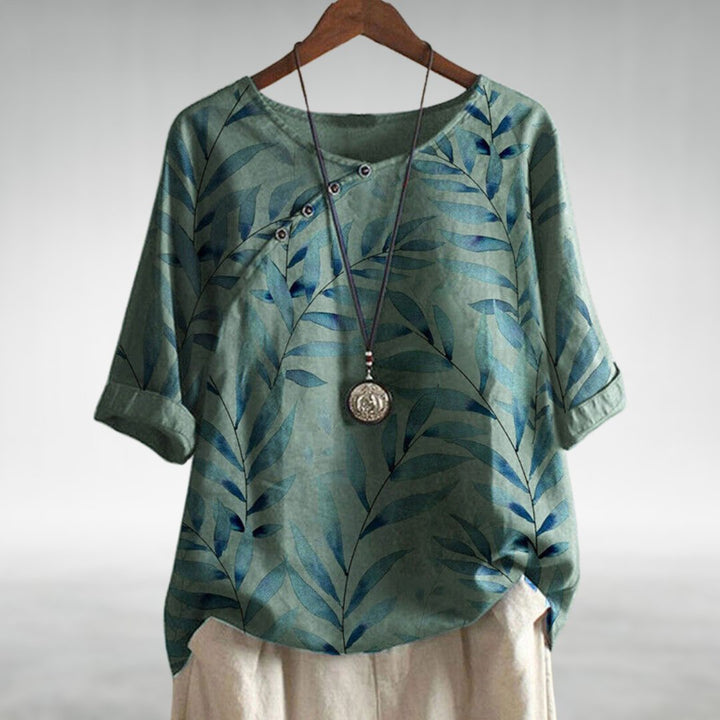 Toni | Elegant blouse with a playful twist