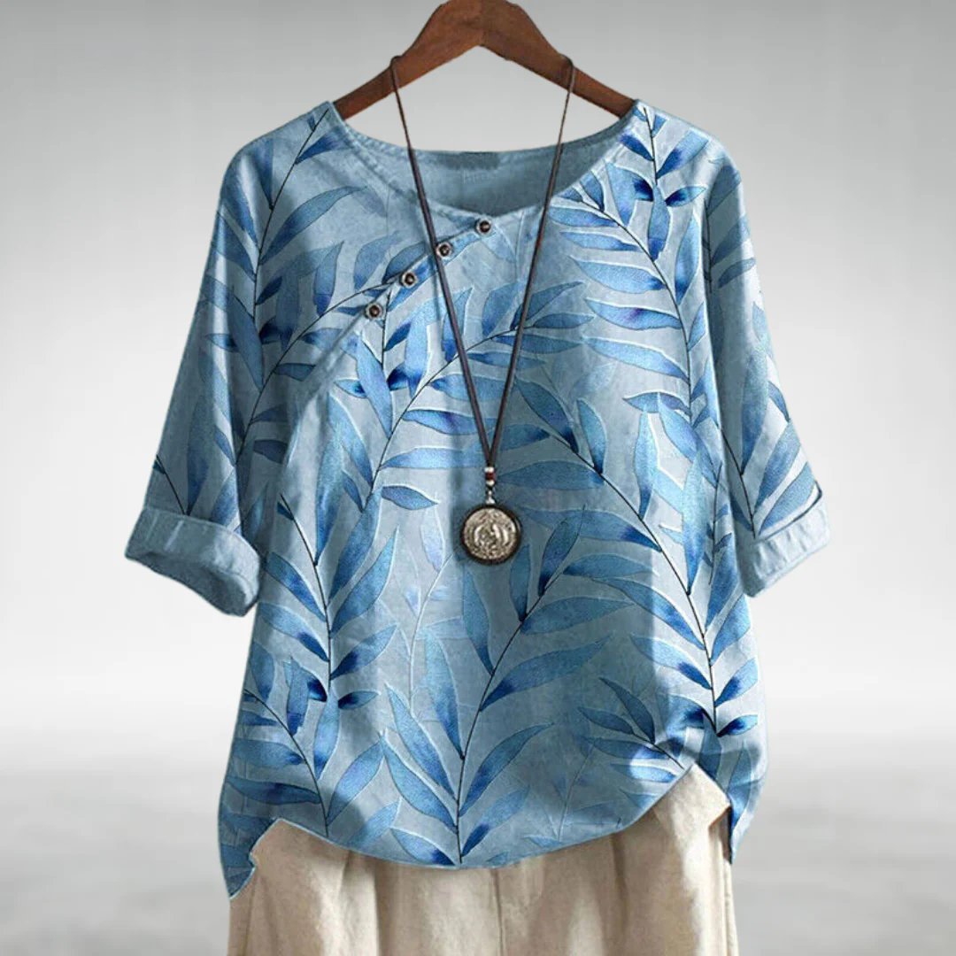 Toni | Elegant blouse with a playful twist